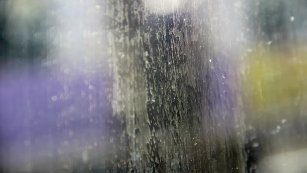 remove hard water stains on glassware